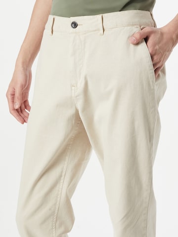 SCOTCH & SODA Tapered Παντελόνι τσίνο 'Drift' σε λευκό