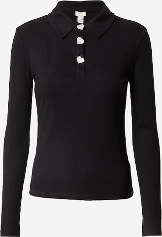 River Island Poloshirt in Schwarz: predná strana