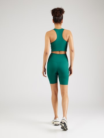 Girlfriend Collective Skinny Spodnie sportowe w kolorze zielony