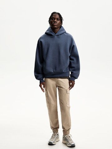 Tapered Pantaloni cargo di Bershka in beige: frontale