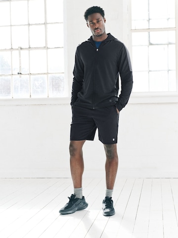 Next Treenitakki värissä musta