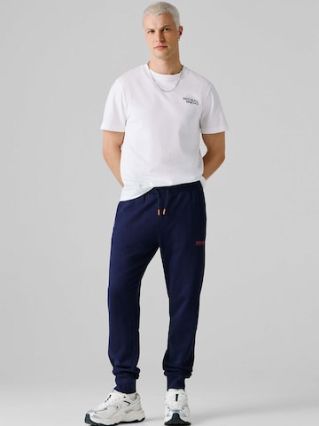 Red Bull Racing x Pepe Jeans Regular Trousers 'RBR Essential' in Blue