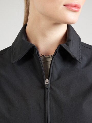 Champion Authentic Athletic Apparel Tussenjas in Zwart