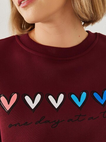 Felpa di Bianco Lucci in rosso