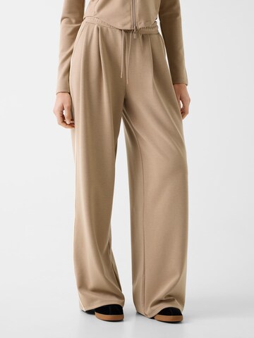 GUESS Slim fit Pants in Brown: front