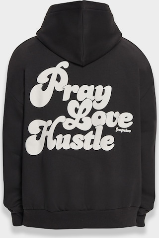 Sweat-shirt 'Pray Love Hustle' Dropsize en noir : devant