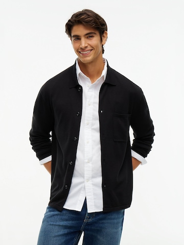 Vestes en maille TOMMY HILFIGER en noir : devant