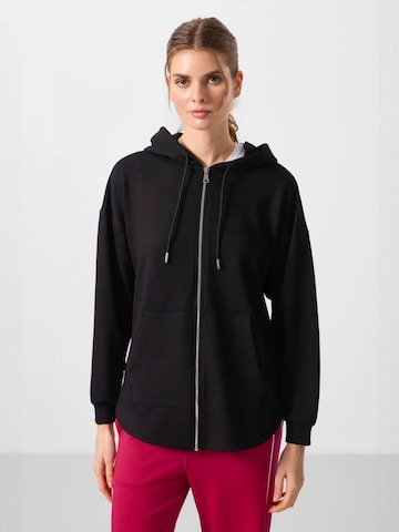 Sweat-shirt Tommy Life en noir : devant