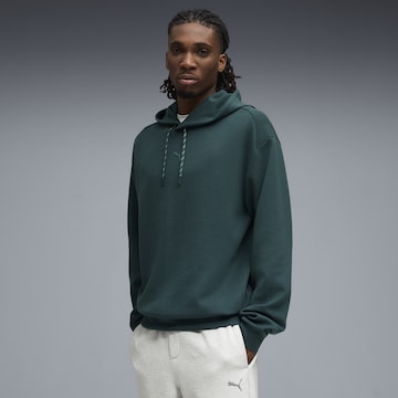 PUMA Sportsweatshirt in Groen: voorkant