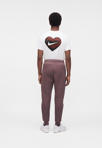 Nike Sportswear - Tapered Calças 'TCH FLC' em azul: atrás