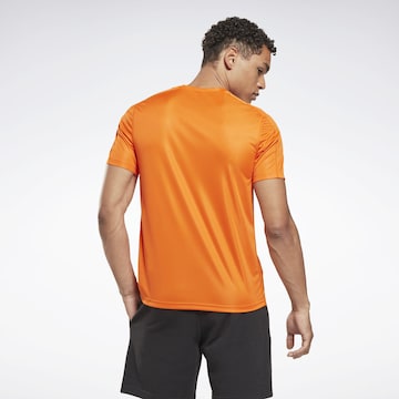 oranžinė Reebok Sportiniai marškinėliai