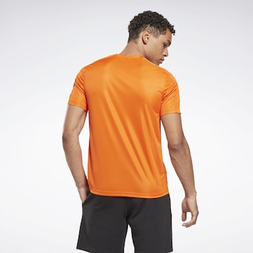 Reebok Funkční tričko – oranžová