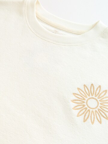 Maglietta di Next in beige