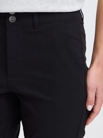 Coupe slim Pantalon ' OXKeily ' Oxmo en noir