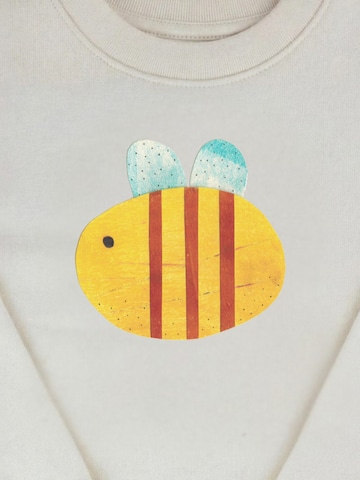MelaDiSweater majica 'Hummel' - bež boja