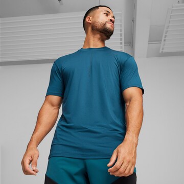 PUMA Performance Shirt 'Yogini Lite' in Blue: front
