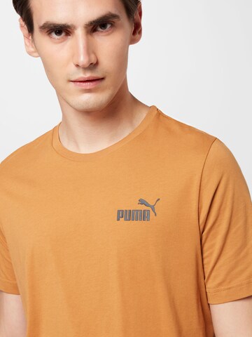 PUMA Performance Shirt 'Essentials' in Beige