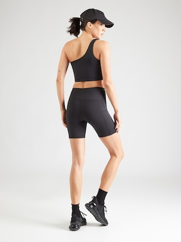 Skinny Pantaloni sportivi di Reebok in nero