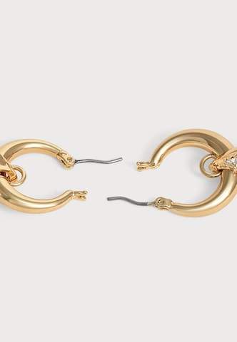 Boucles d'oreilles DKNY en or