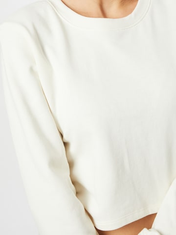 PUMA Αθλητική μπλούζα φούτερ 'EXHALE' σε λευκό