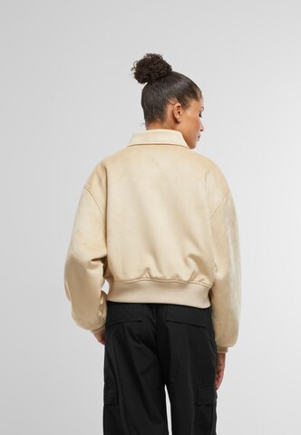Veste mi-saison 'Os' Karl Kani en beige