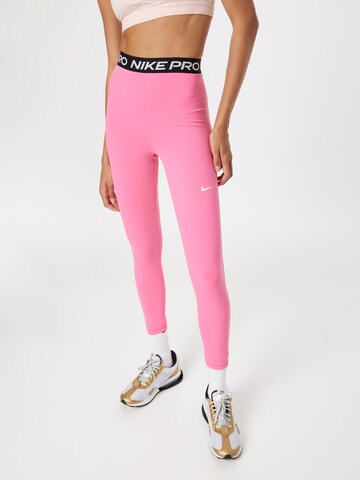 Skinny Pantalon de sport NIKE en rose : devant