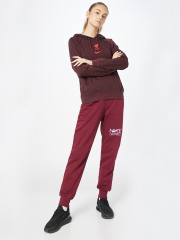 Nike Sportswear Дънки Tapered Leg Панталон в червено