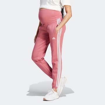 ADIDAS SPORTSWEAR - Tapered Calças de desporto em rosa: frente