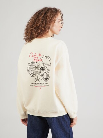 Kaotiko Μπλούζα φούτερ 'PARIS COFFEE' σε μπεζ: μπροστά