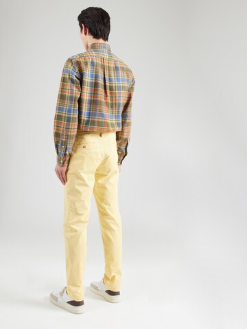 Slimfit Pantaloni eleganți 'BEDFORD' de la Polo Ralph Lauren pe galben