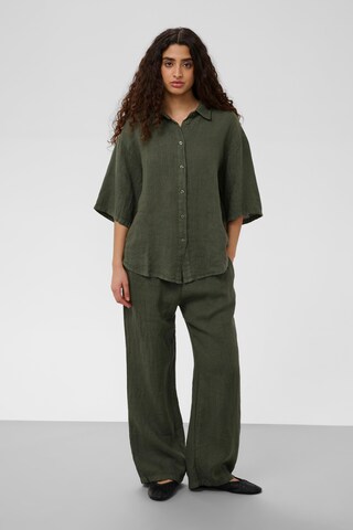 SOAKED IN LUXURY - Camisa em verde
