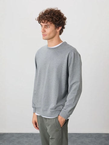 Sweat-shirt Tommy Life en gris