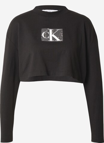 T-shirt Calvin Klein Jeans en noir : devant