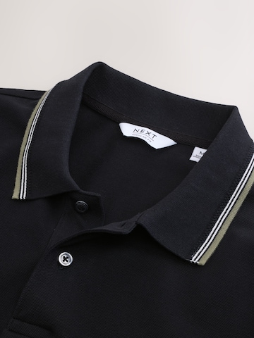 Tricou de la Next pe negru