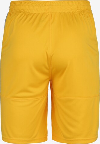 PUMA Loose fit Workout Pants in Yellow
