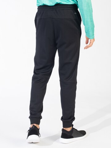 Effilé Pantalon de sport Spyder en noir