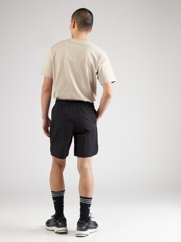 ADIDAS SPORTSWEAR Regular Sports trousers 'City Escape' in Black