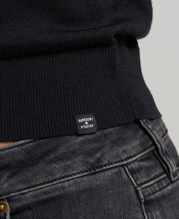 Tops en tricot Superdry en noir