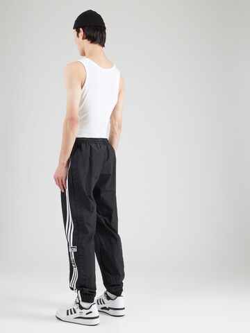 ADIDAS ORIGINALS - Tapered Pantalón 'ADIBREAK' en negro