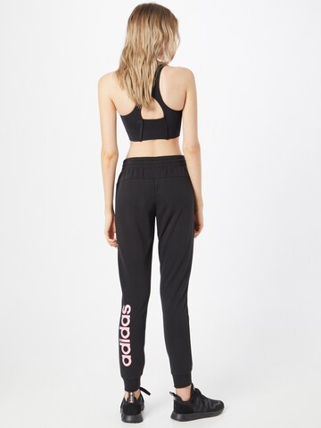 ADIDAS SPORTSWEAR Loose fit Sports trousers in Black