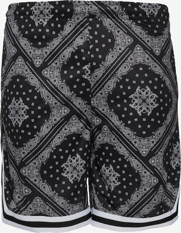 Karl Kani Loosefit Housut värissä musta: etupuoli