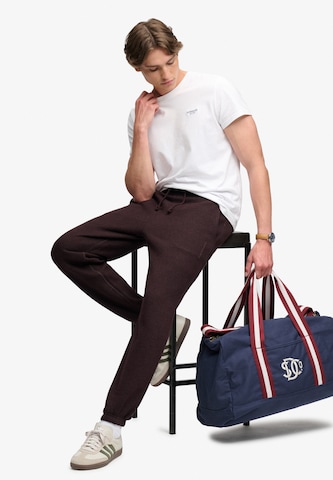 Superdry & Co Zúžený Kalhoty 'Essential' – červená