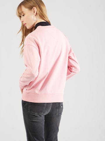Tommy JeansSweater majica 'ESSENTIAL' - roza boja