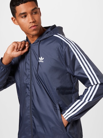 ADIDAS ORIGINALS Prechodná bunda - Modrá