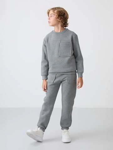 Tommy Life Tréningruha 'TOMMY Kinder Active Set' - szürke