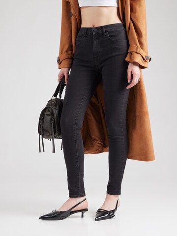 WRANGLER Skinny Jeans in Black: front