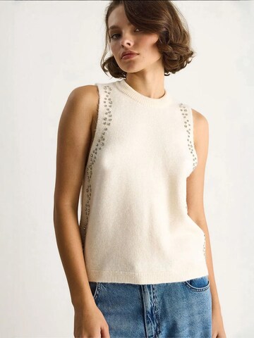 Top in maglia di Bianco Lucci in beige: frontale