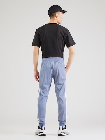 ADIDAS SPORTSWEAR Tapered Sports trousers in Blue