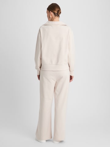 Guido Maria Kretschmer Women Voľný strih Nohavice 'Georgina' - Béžová