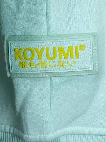 Koyumi Sweatshirt 'Free your Neck' in Groen